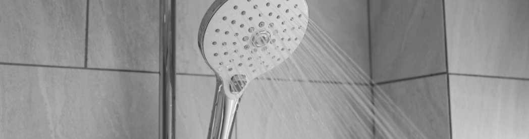Shower Head Running with grey titled backgrounds
