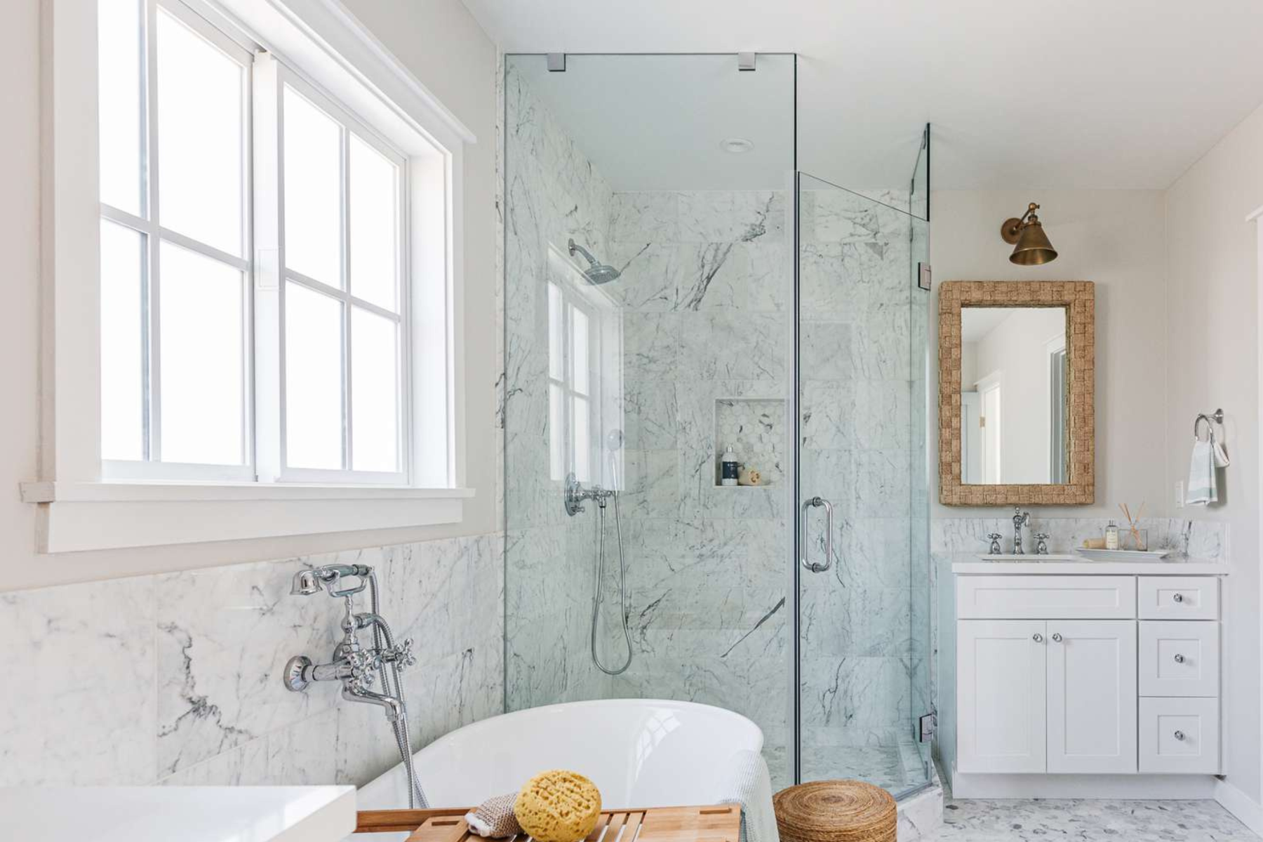 Marble White Bathroom With Frameless Shower Feautre