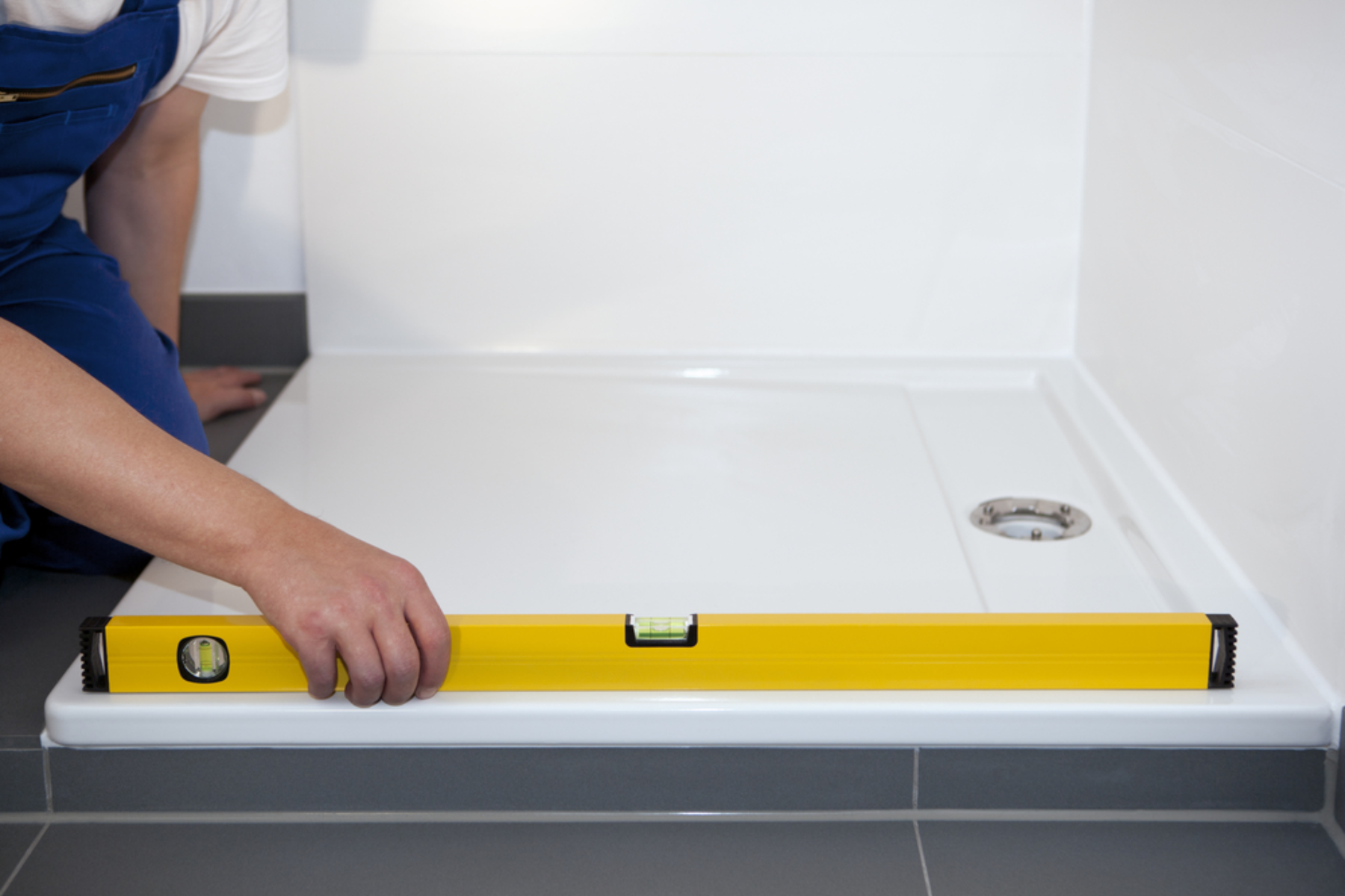 Shower Tray Getting Measure Out By Plumber
